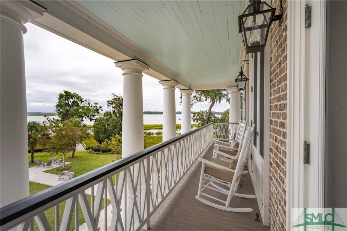 Balcony with rocking chairs.