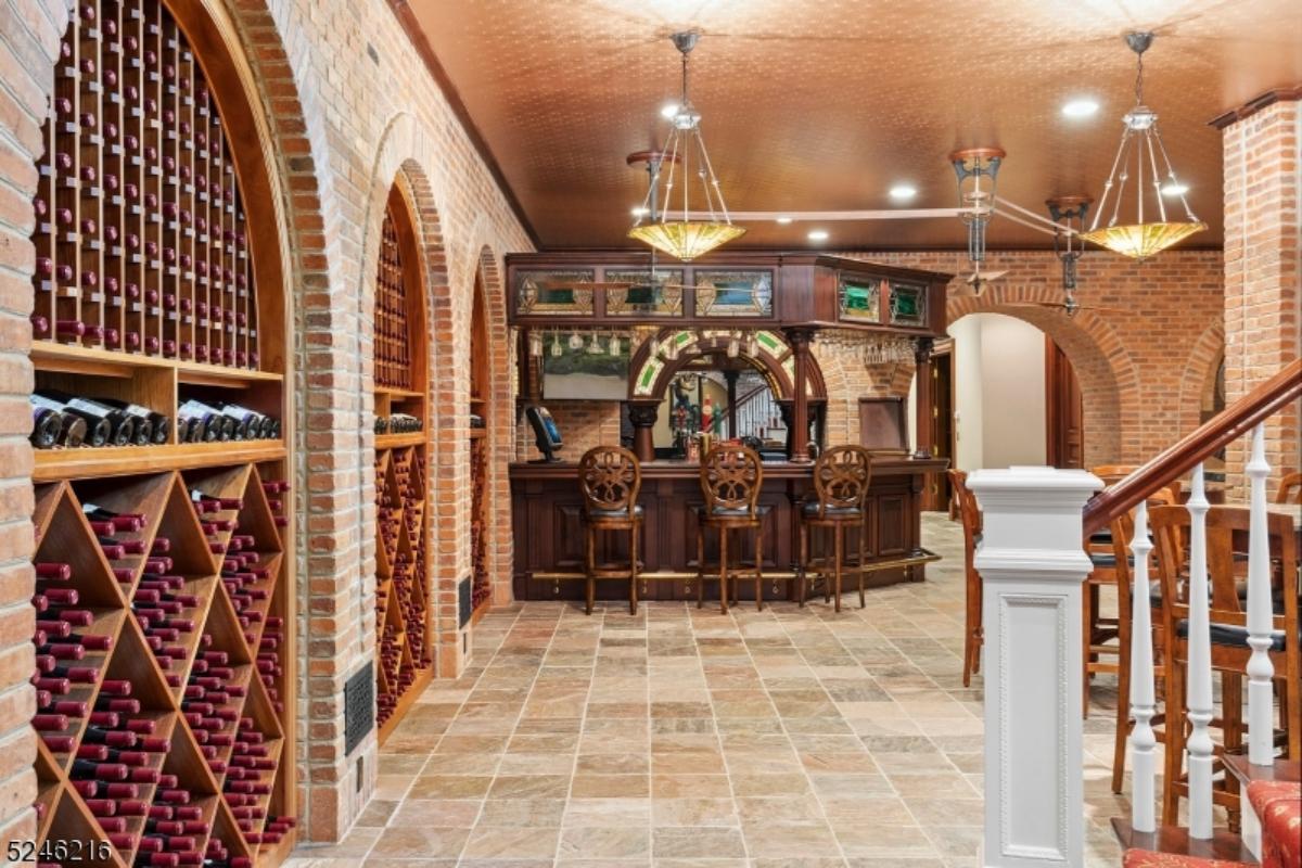 Wine Cellar with a bar and custom lights.