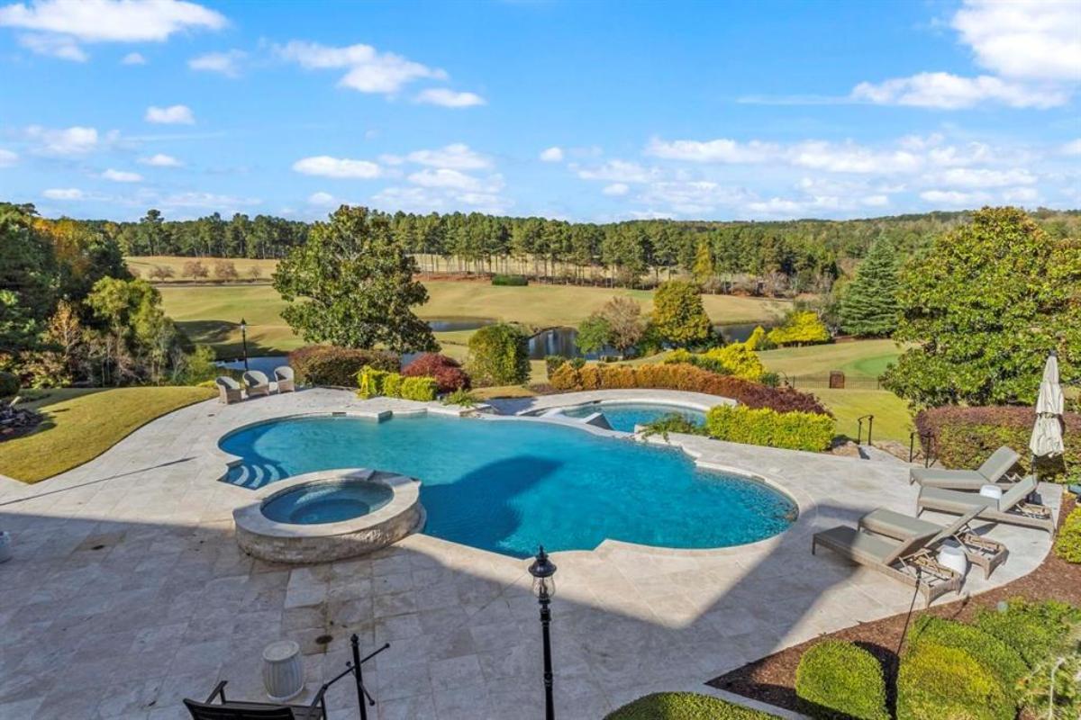 Pool with lounge chairs.