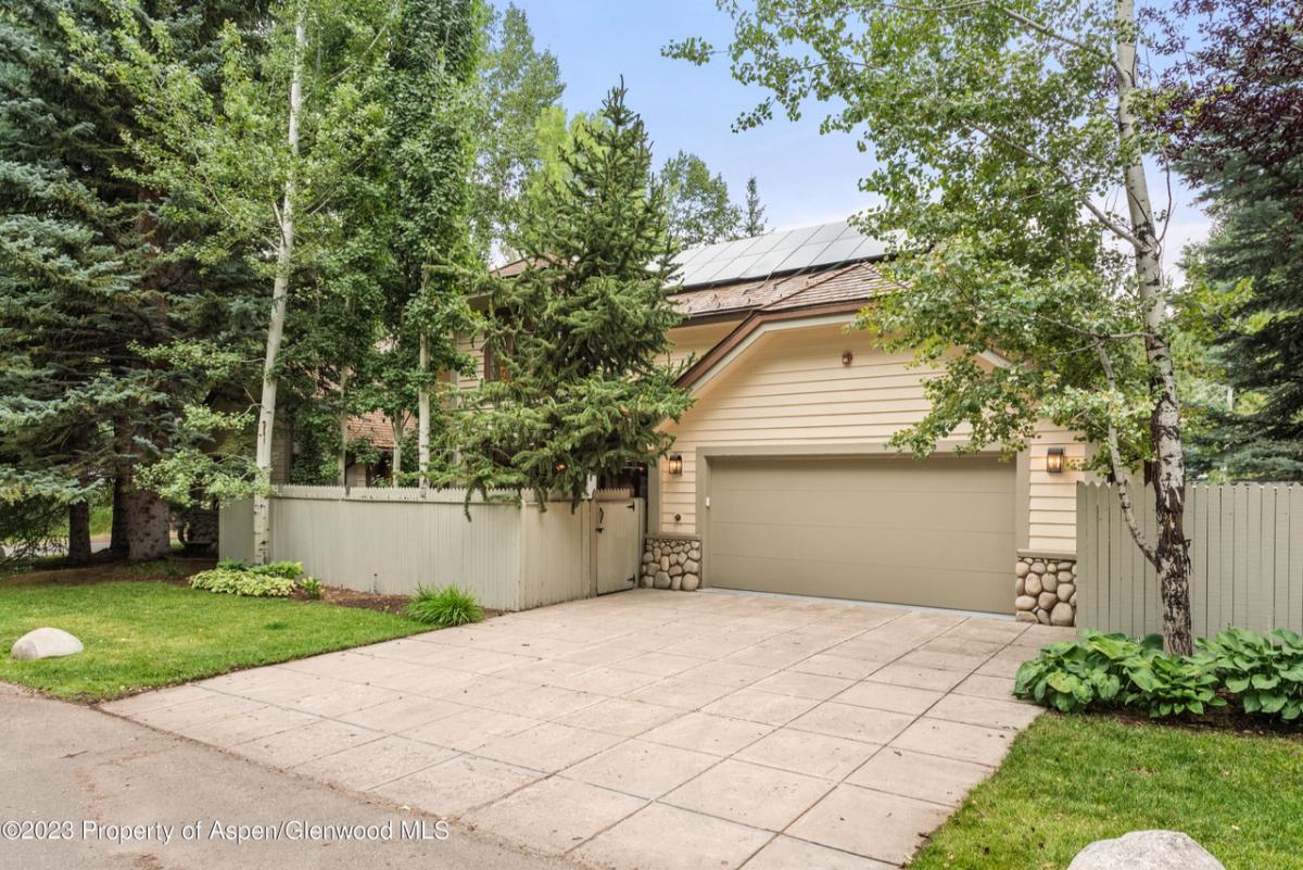 Garage with a driveway.