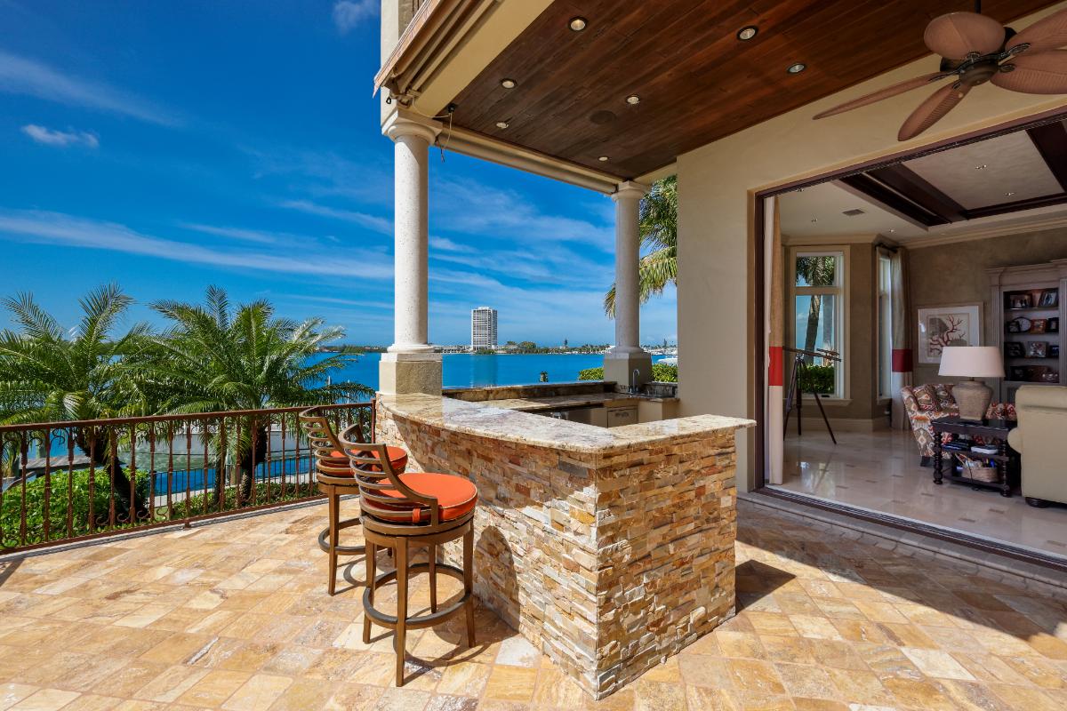 Outdoor kitchen overlooking the water.