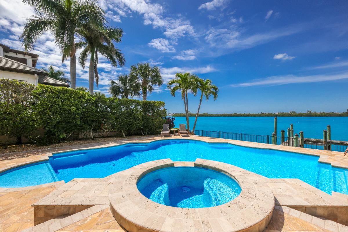 Pool with a view of the water.