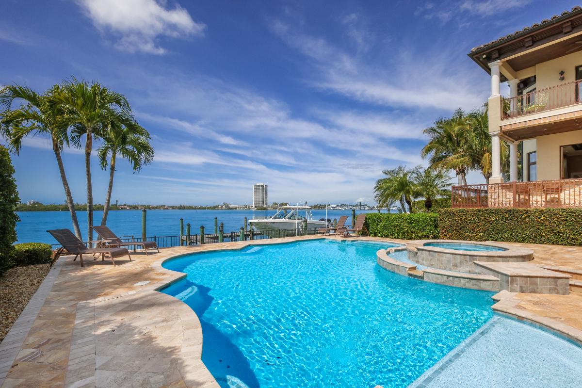 Pool with a view of the water.