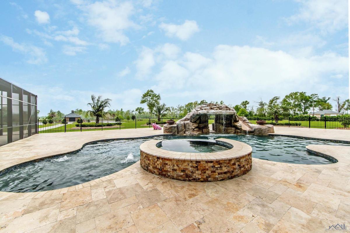 Pool with a waterfall fountain.