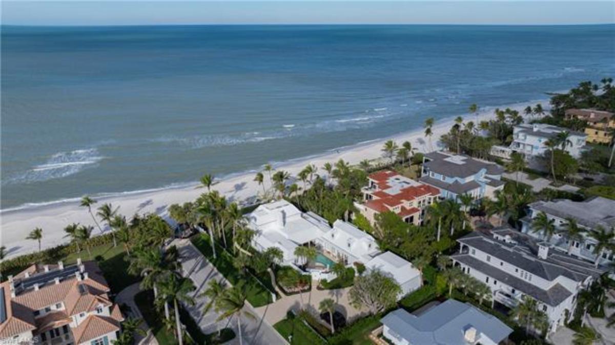 Aerial view of the property nearby residences.