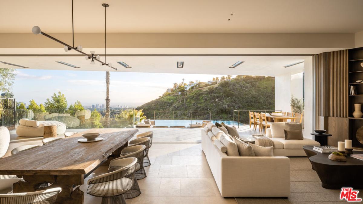Dining room with a large wooden table.