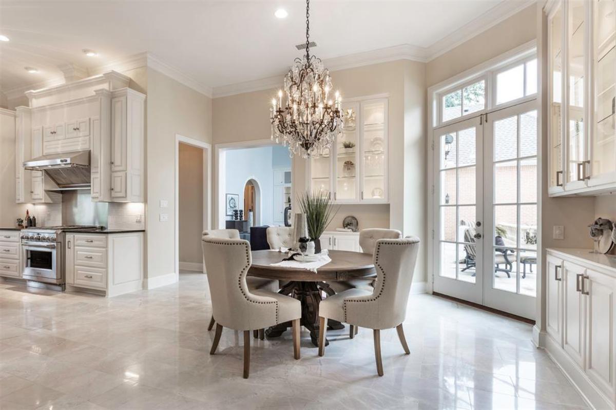 Breakfast nook with a chandelier.