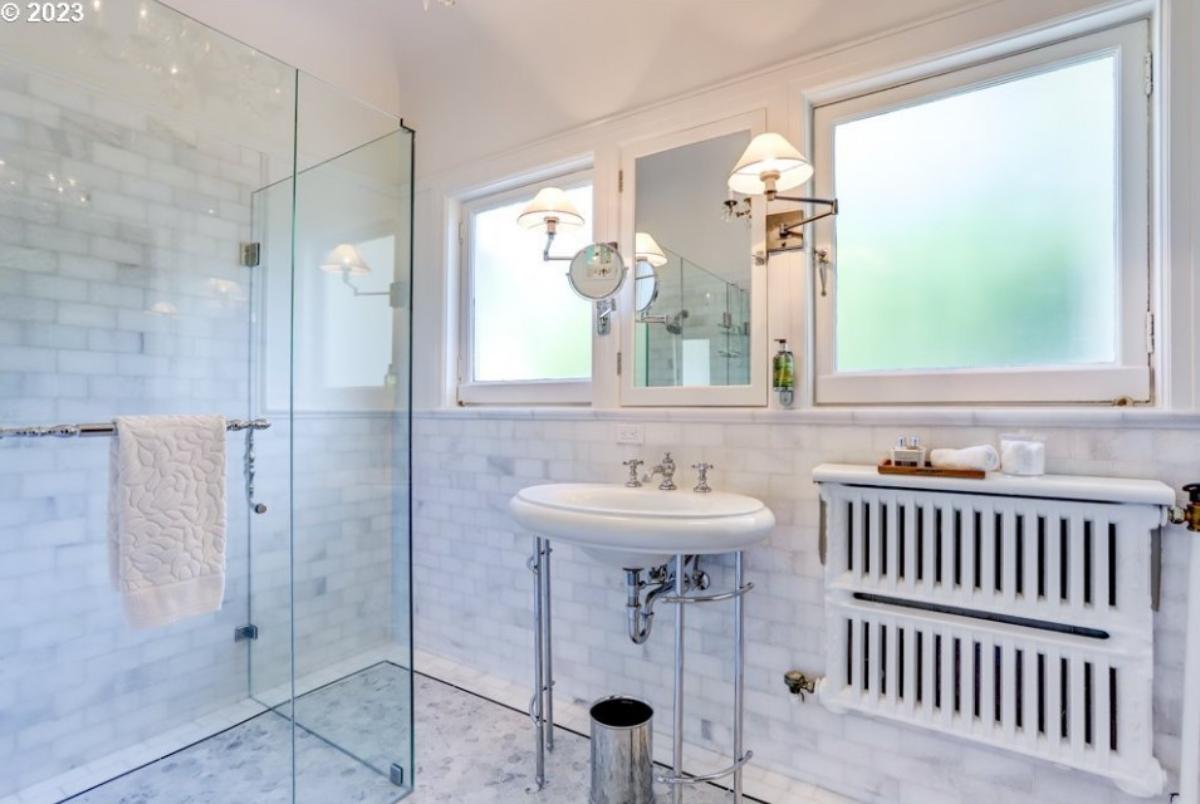 Bathroom with a sink and a walk-in shower.