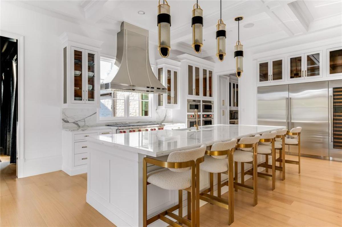Kitchen with a large island and custom cabinetry,