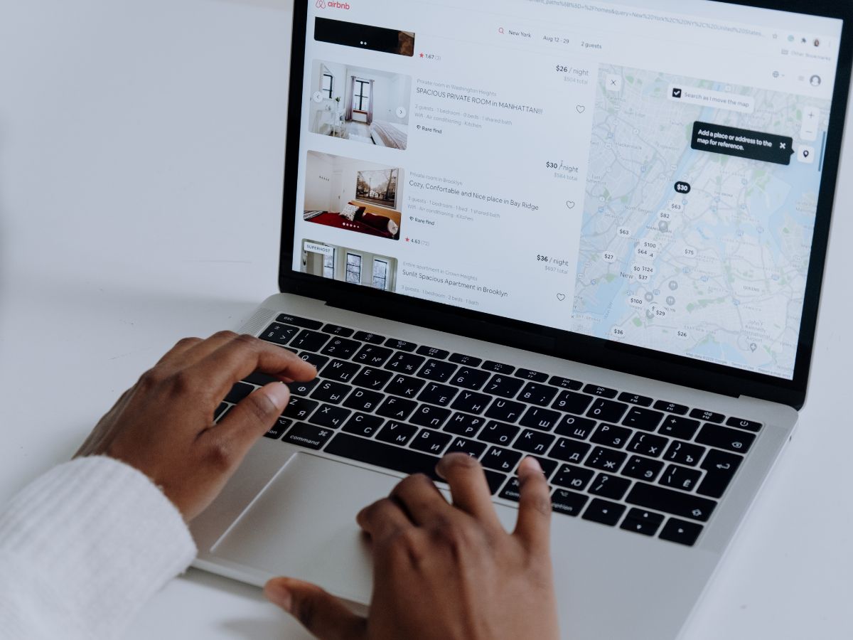 Airbnb listings on laptop