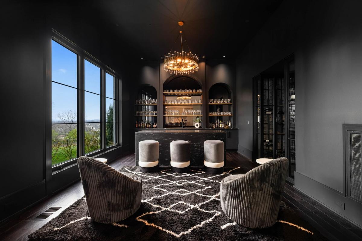 Bar with chairs and sofas.