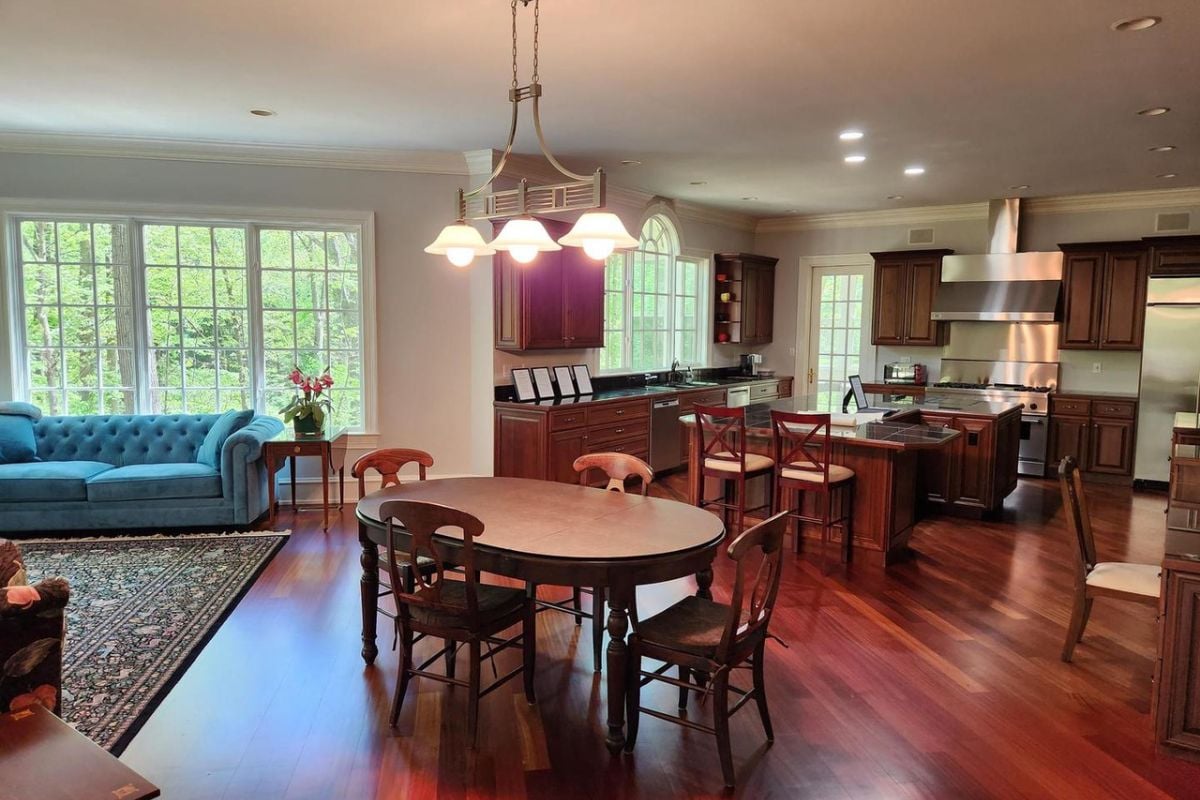 A great room combining living space, a dining area, and a kitchen.