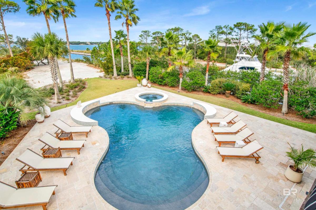 Pool with lounge chairs.