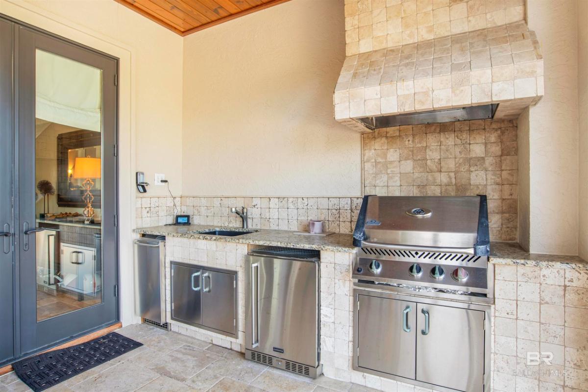 Grill area with a sink.