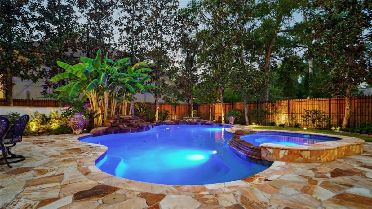 Pool with a man-made waterfalls.