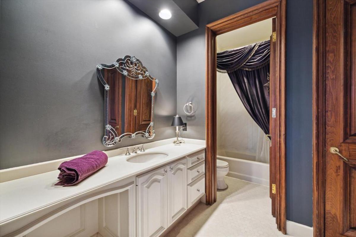 Bathroom with a sink and a toilet.