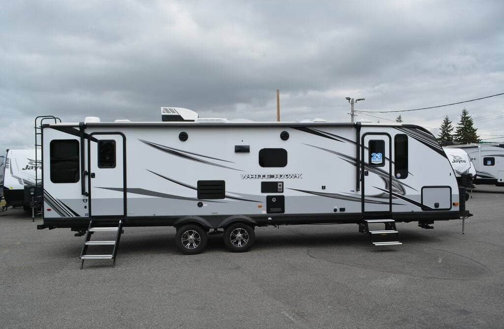 Left view of the 2023 Jayco White Hawk 29RL Travel Trailer RV.