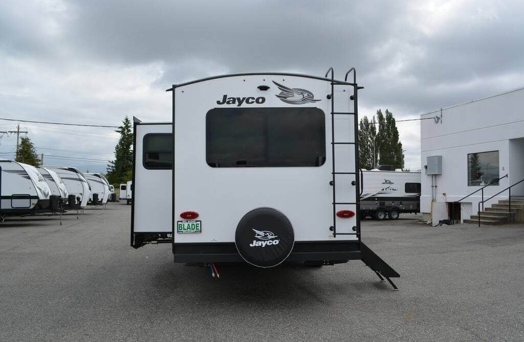 Rear view of the 2023 Jayco White Hawk 29RL Travel Trailer RV.