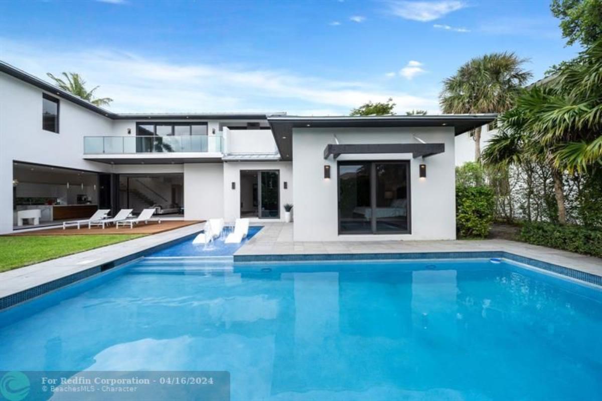 Pool with lounge chairs.