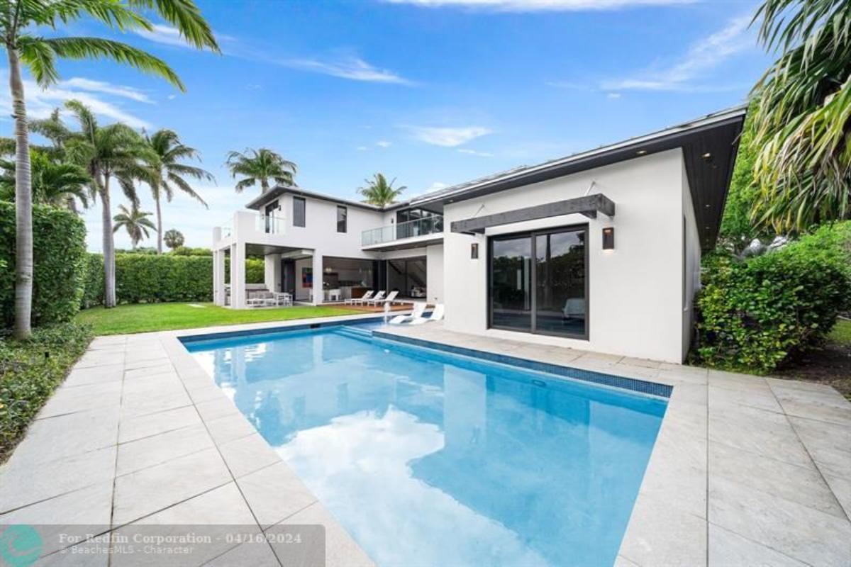 Pool with lounge chairs.