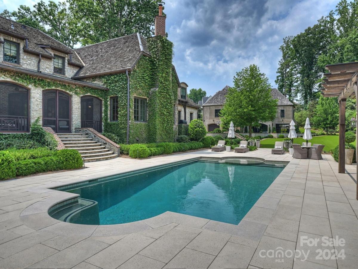 Pool with lounge chairs.