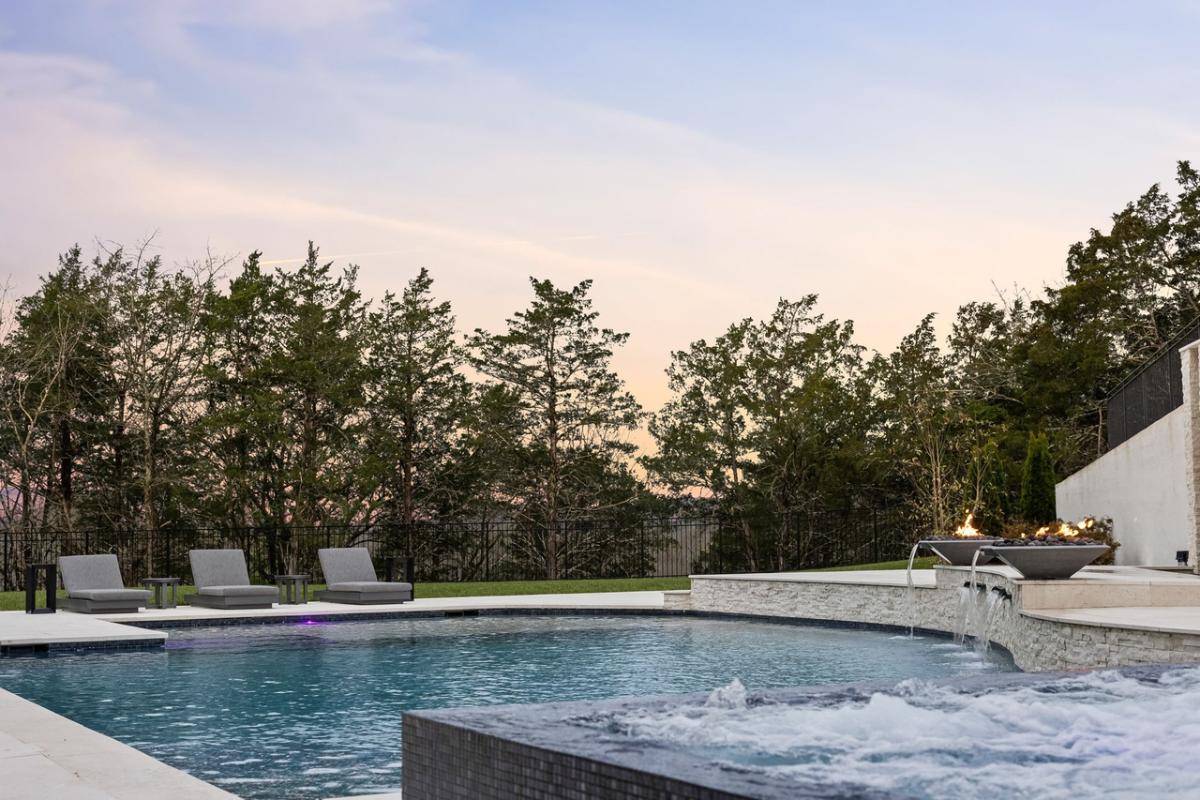 Pool with lounge chairs.