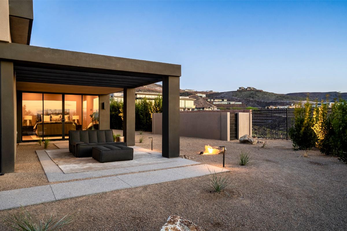 Patio with a table and a sofa.