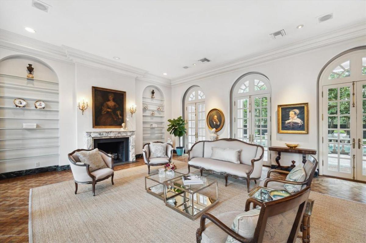 Living room with sofas and a fireplace.