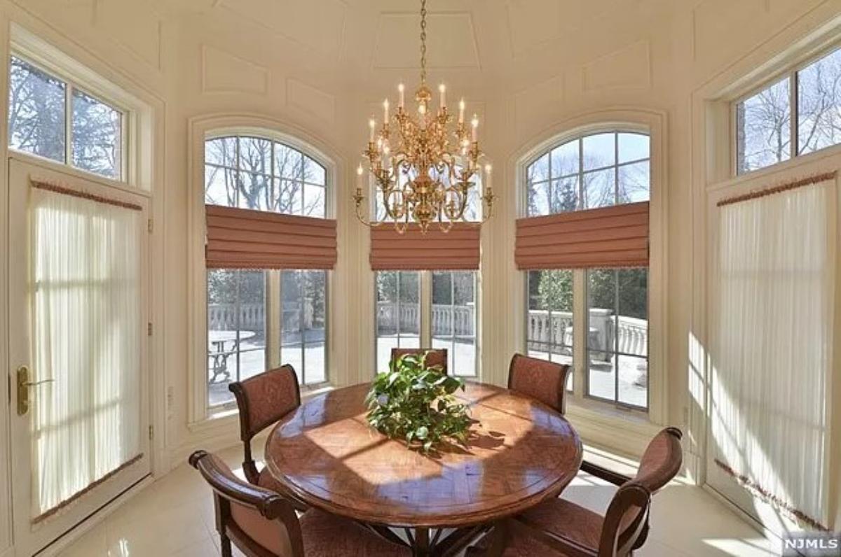 Breakfast nook with a chandelier.
