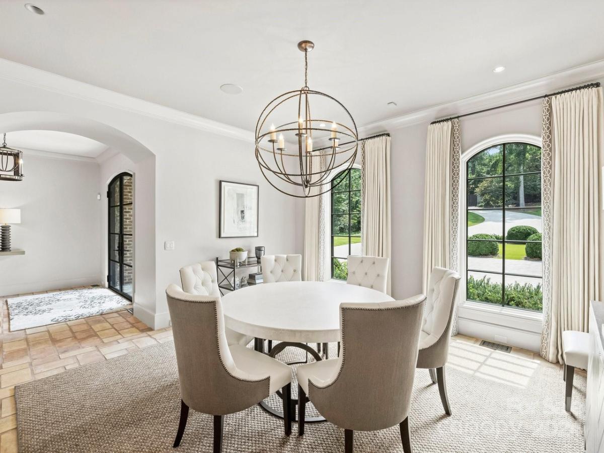 Breakfast nook with a chandelier.