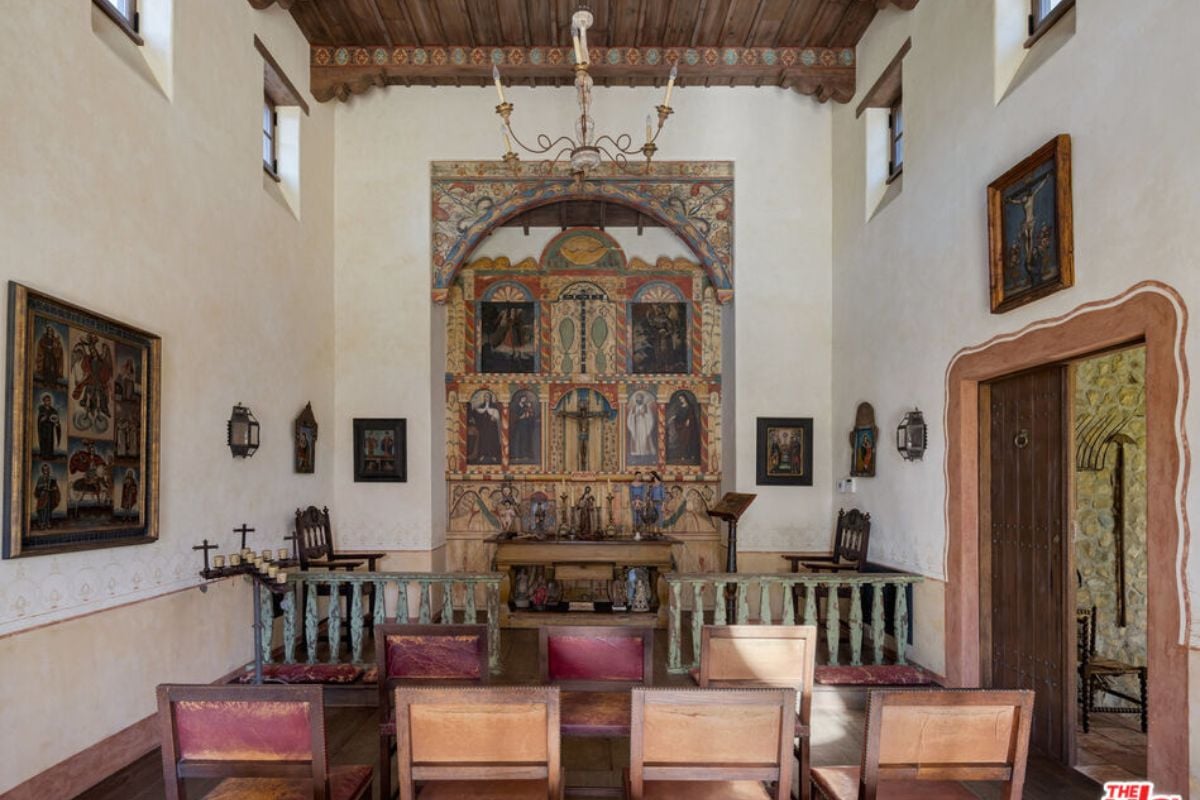 A chapel with religious items and chairs.