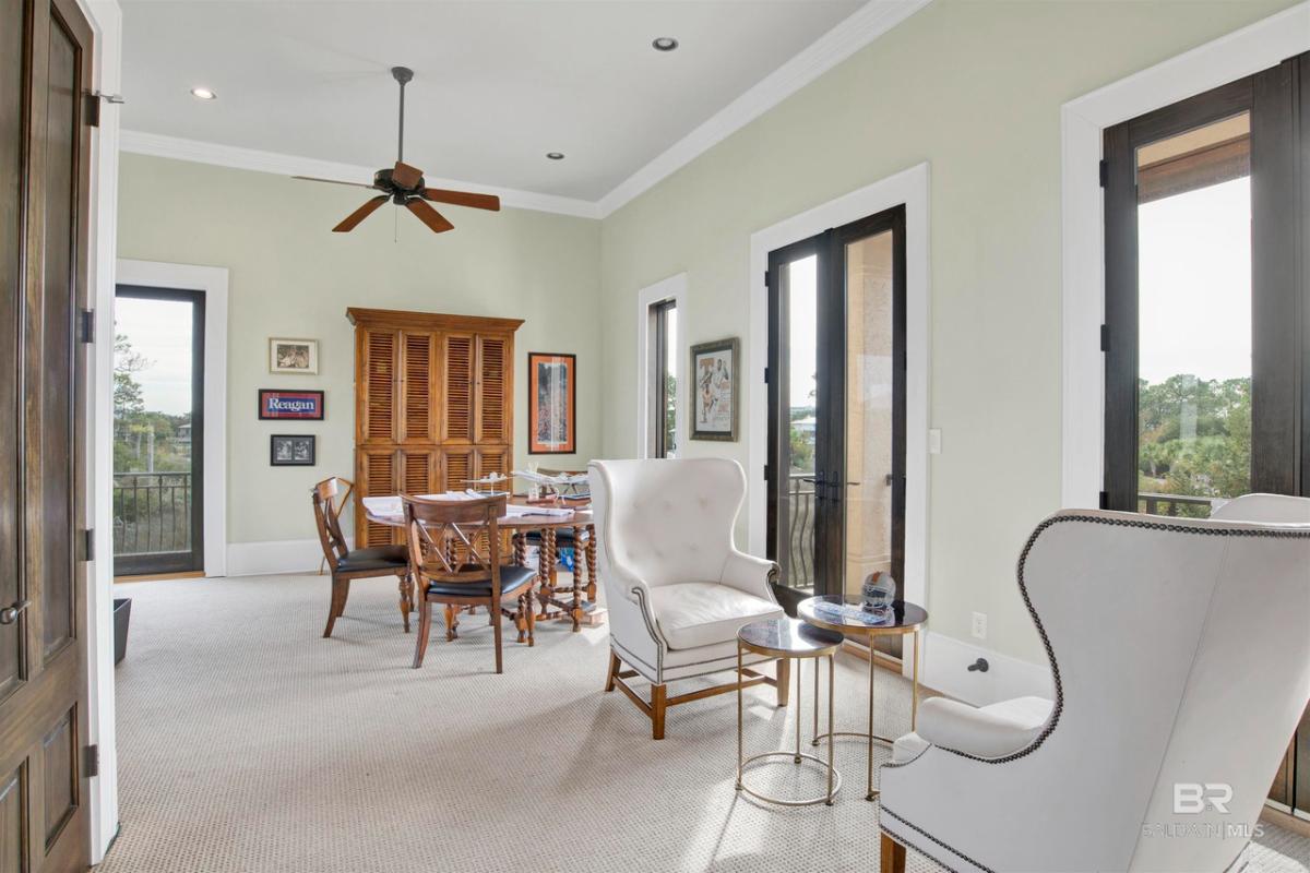 Sitting area with tables and chairs.