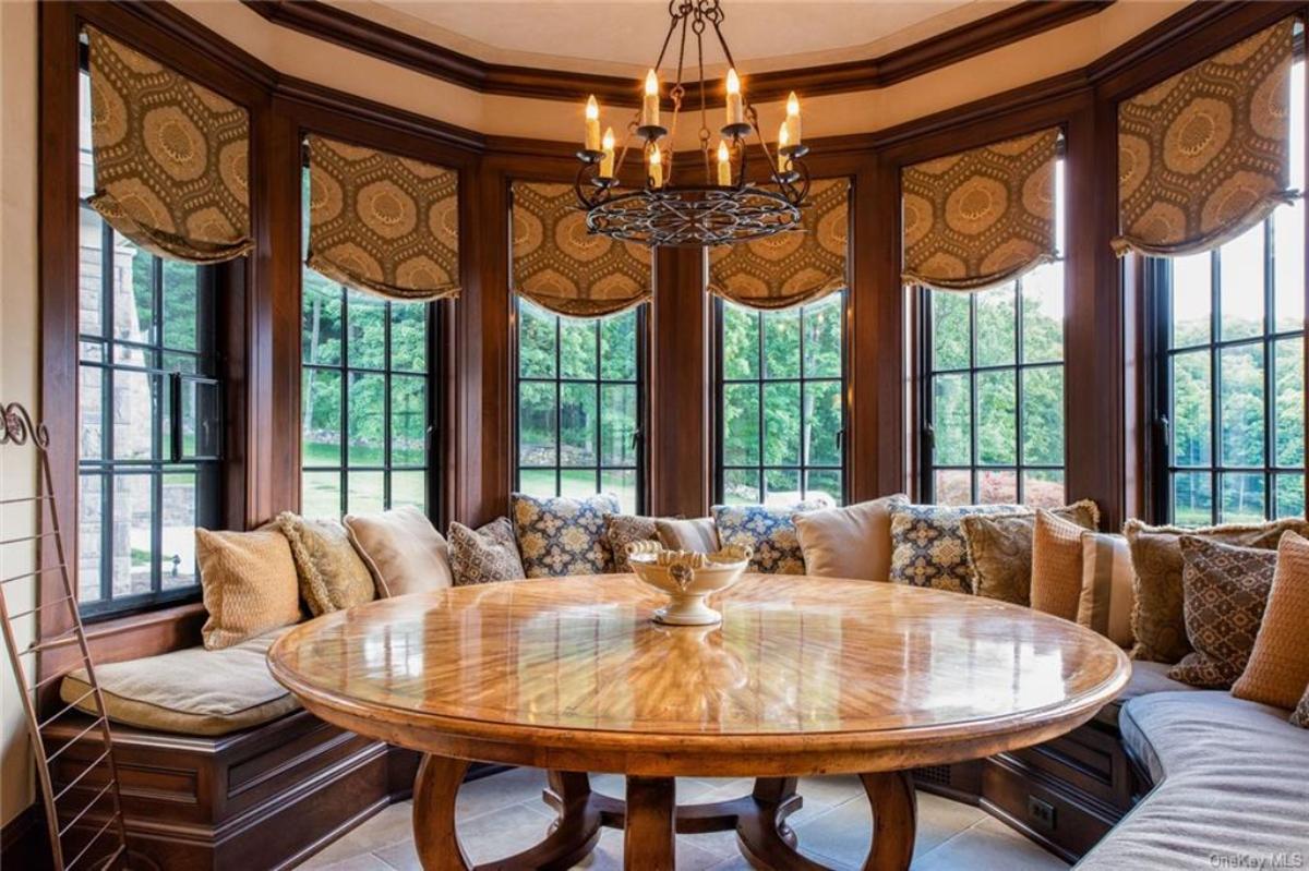 Breakfast nook with glass windows.