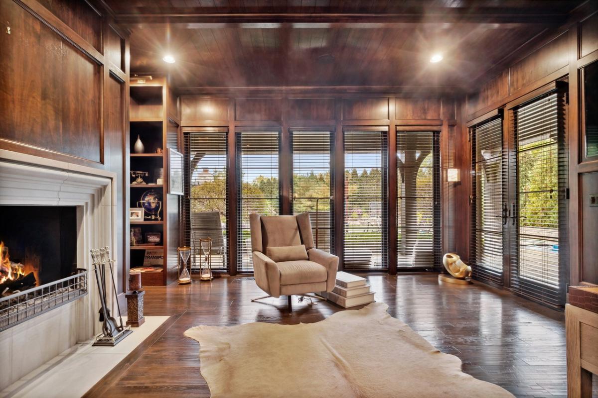 Reading room with a fireplace