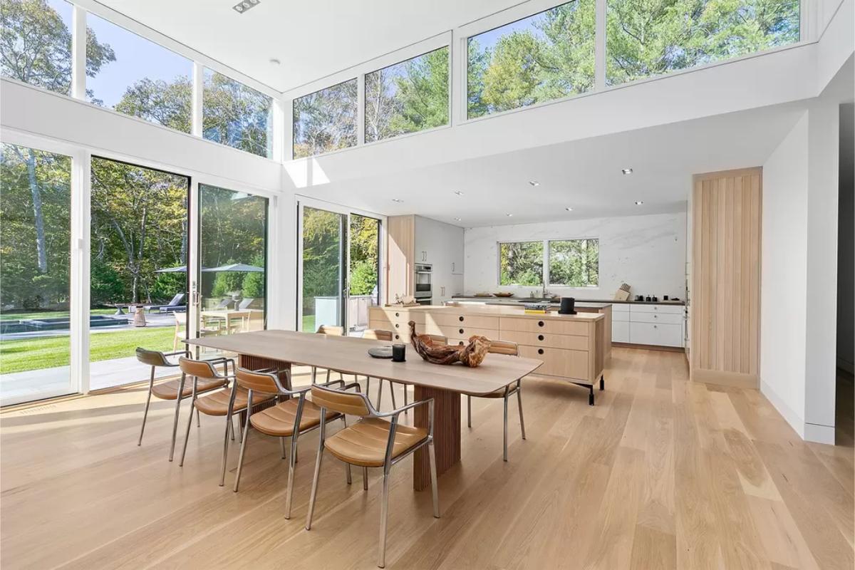 Dining room with a wood table and chairs.