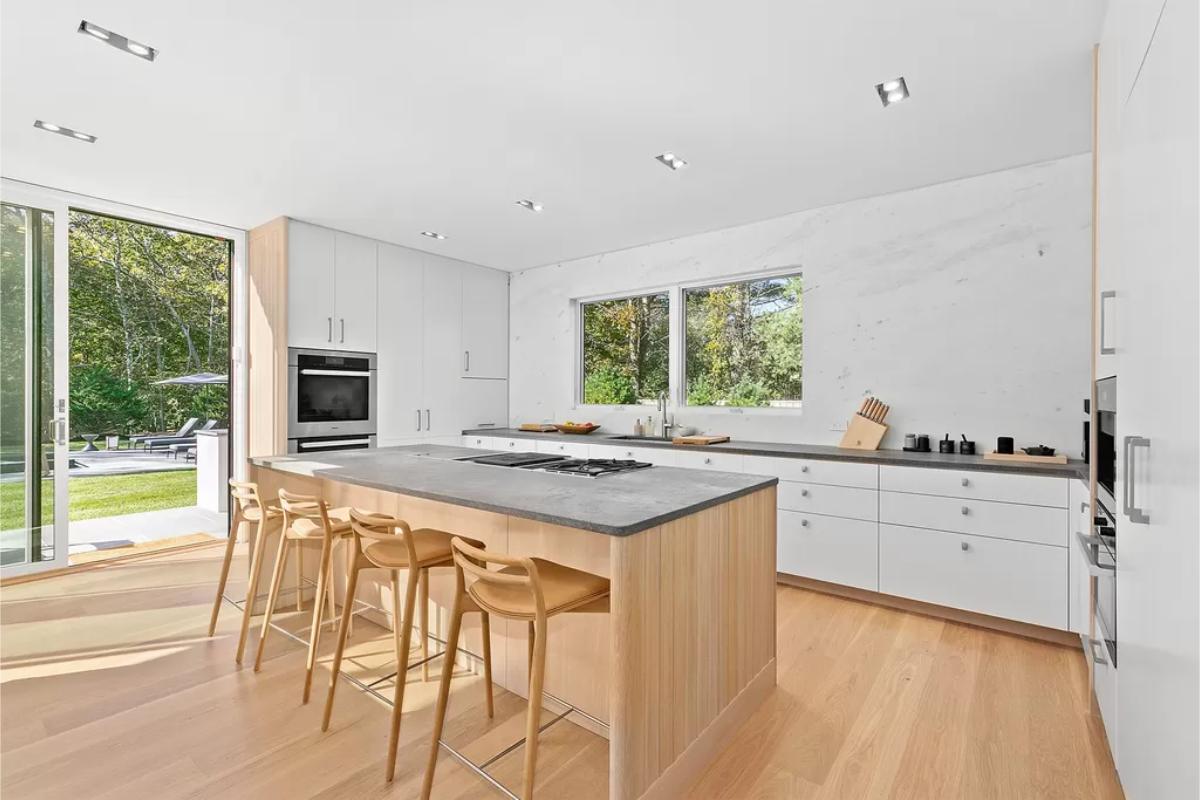 Kitchen with a large island and custom cabinetry.