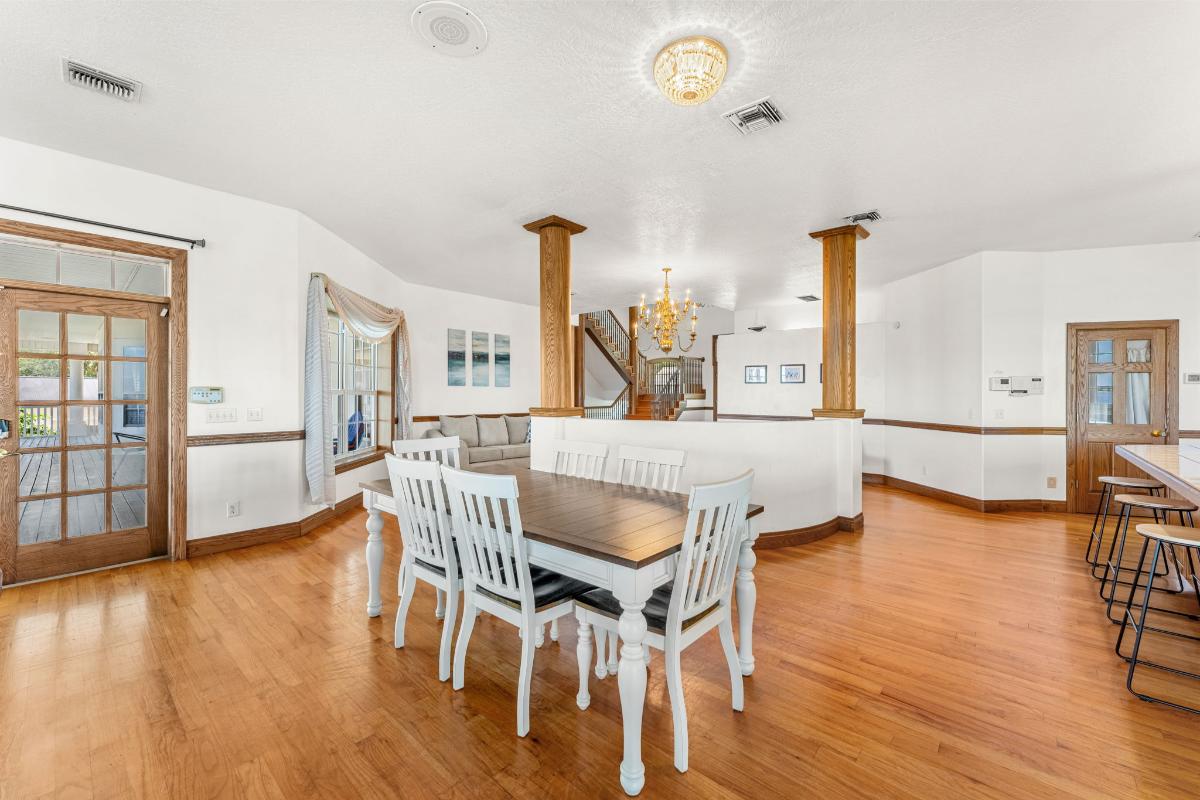 Breakfast nook with wood table and chairs.