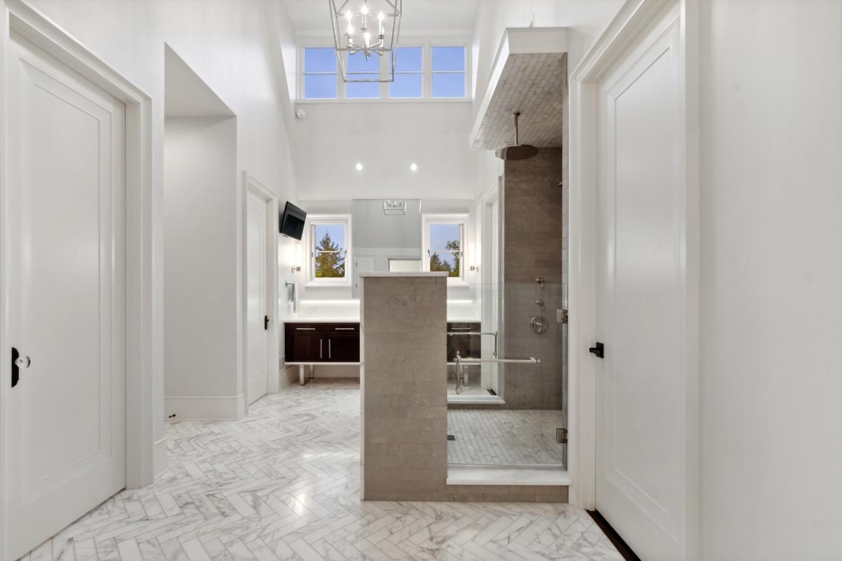 Bathroom with a sink and a walk-in shower.