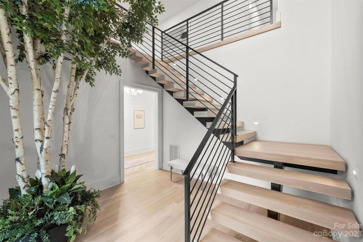 Stairs with metal railings.