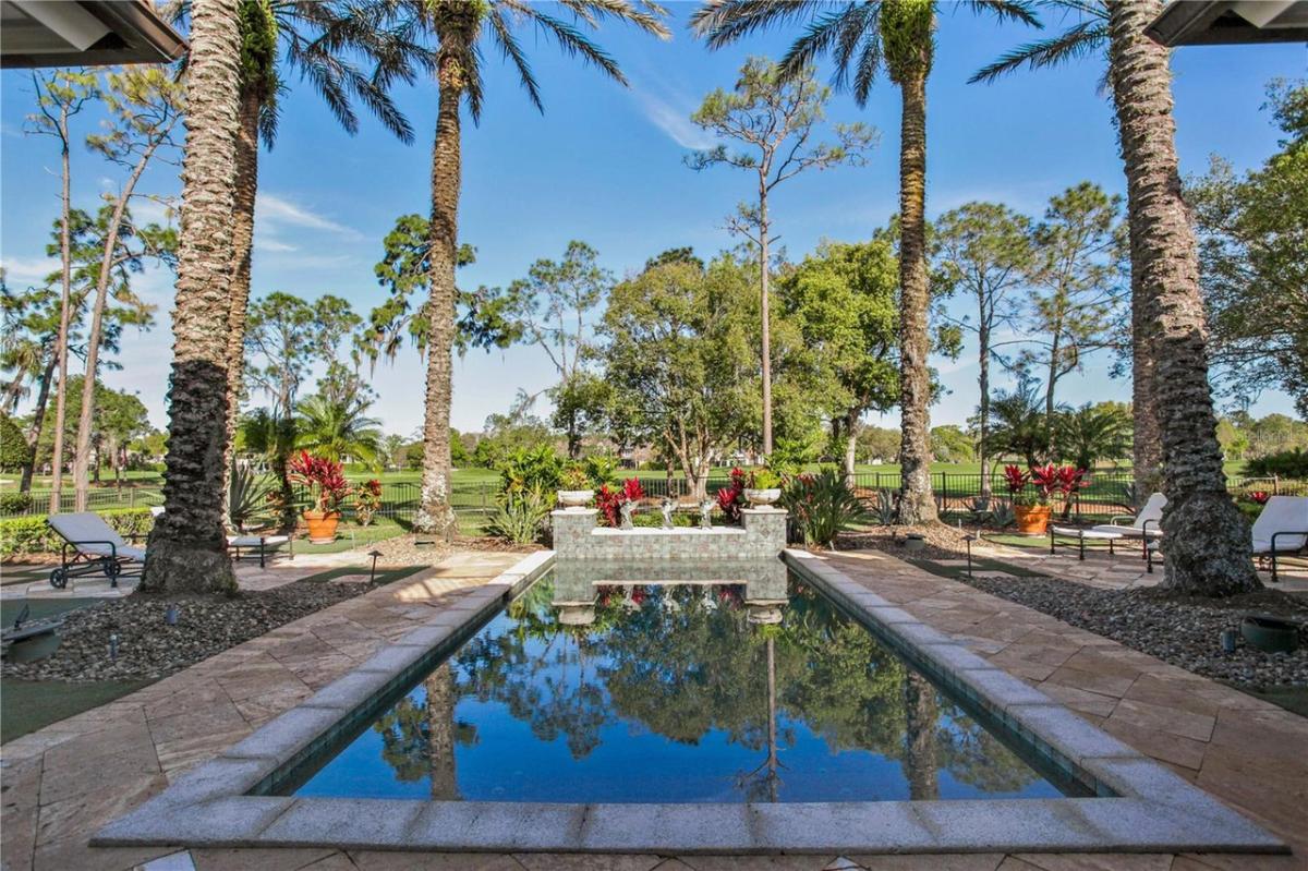 Pool with lounge chairs.