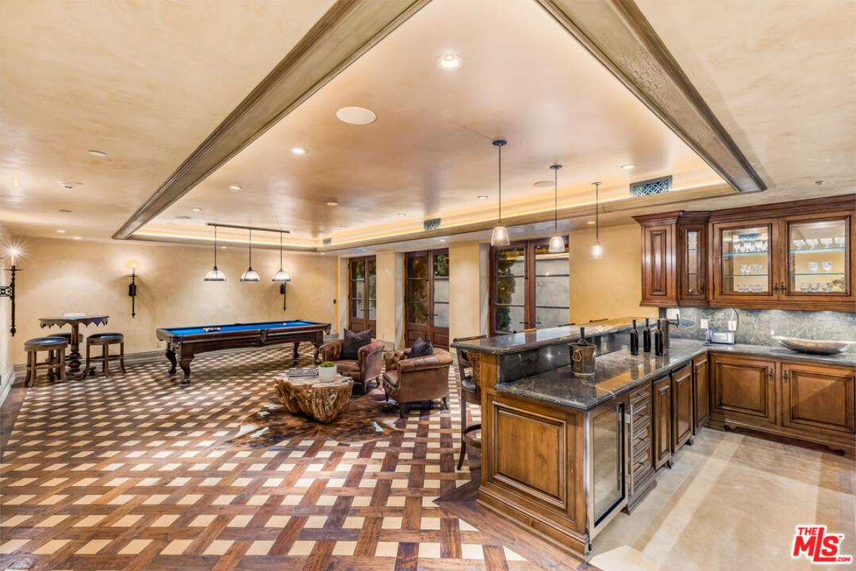 Recreational room with billiards table.