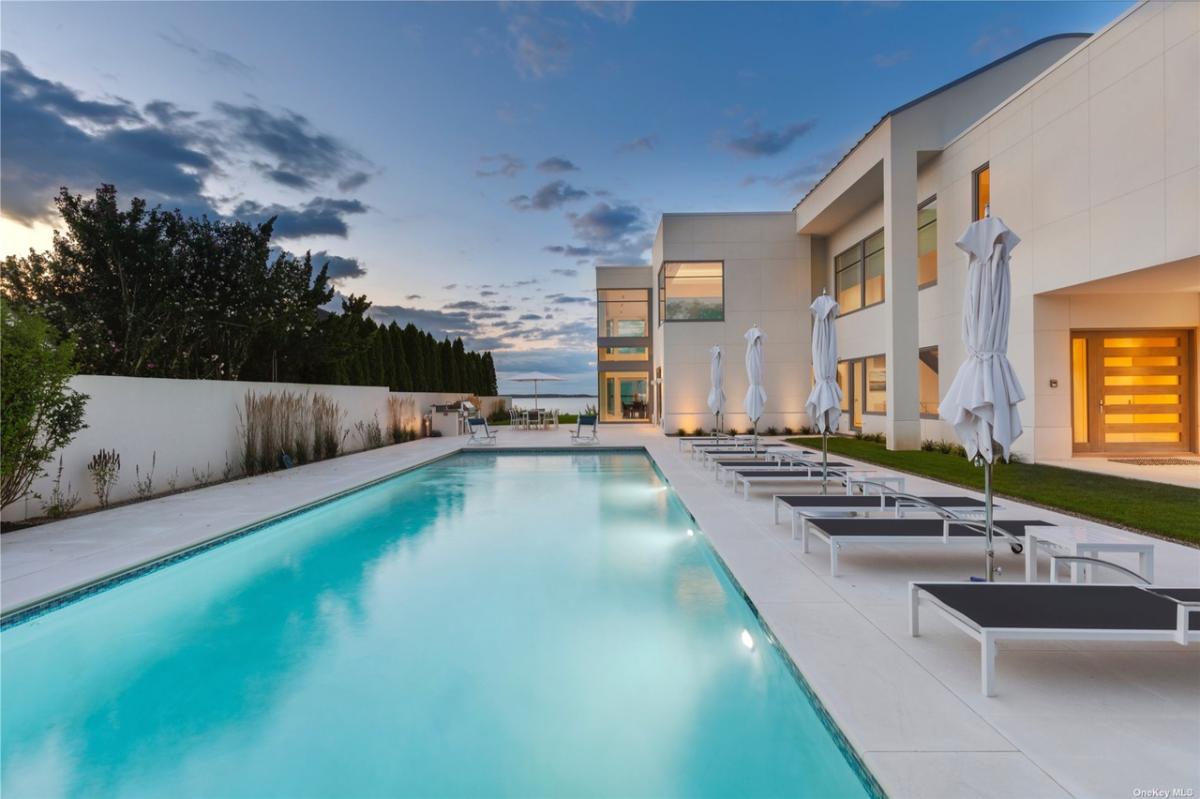 Pool with lounge chairs.