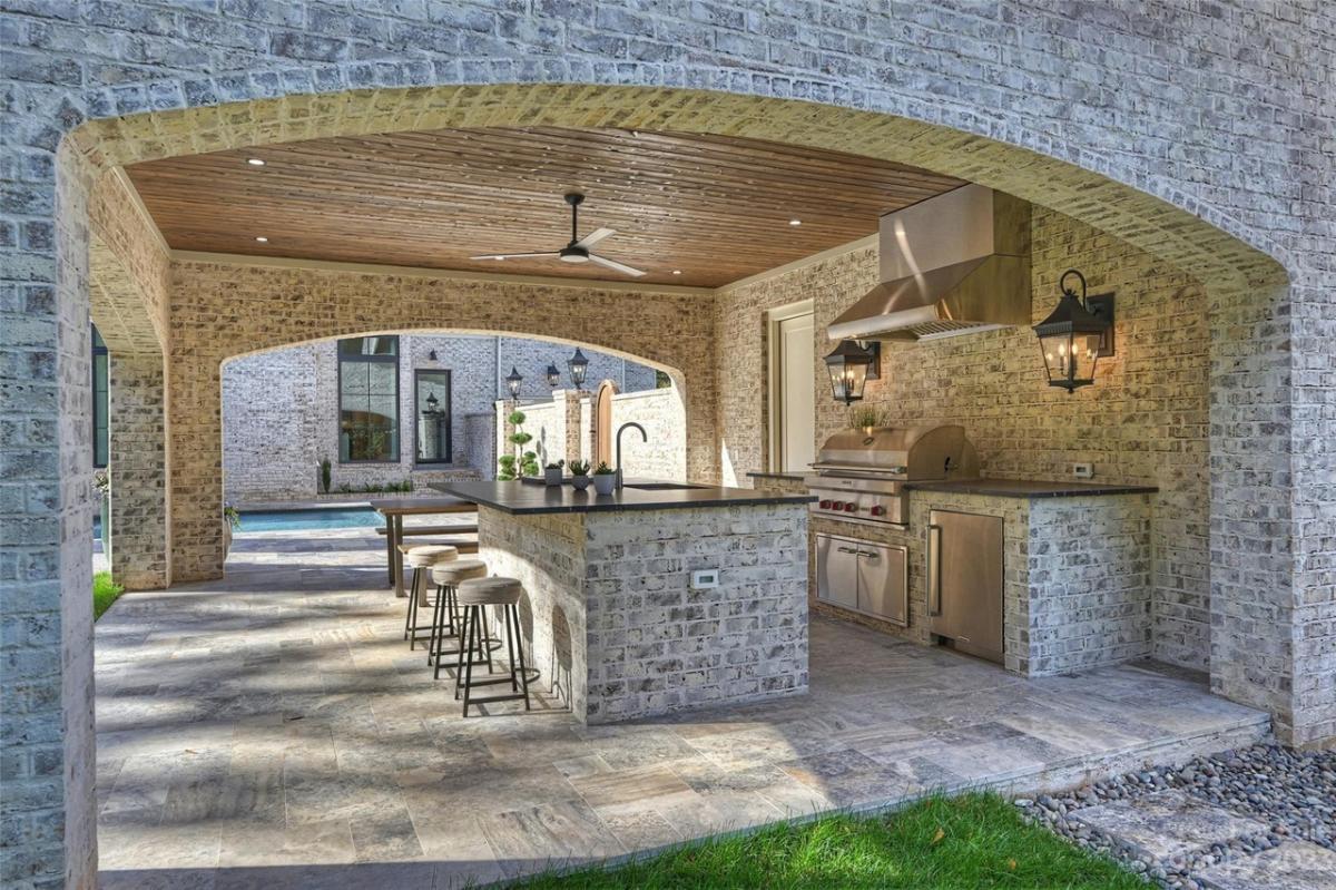 Outdoor kitchen with a grill area.