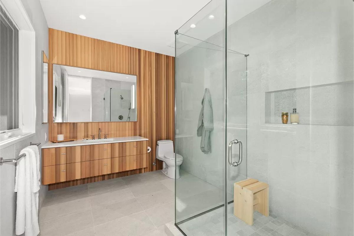 Bathroom with a sink, soaking tub and a walk-in shower.