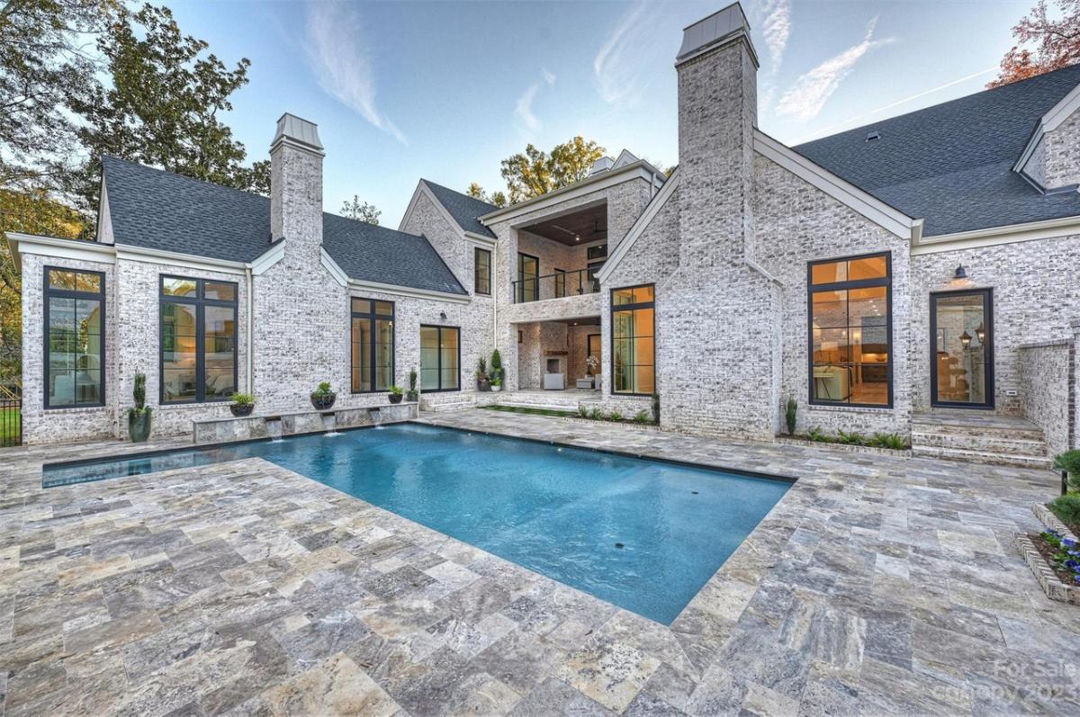 Rear view of the mansion with pool.