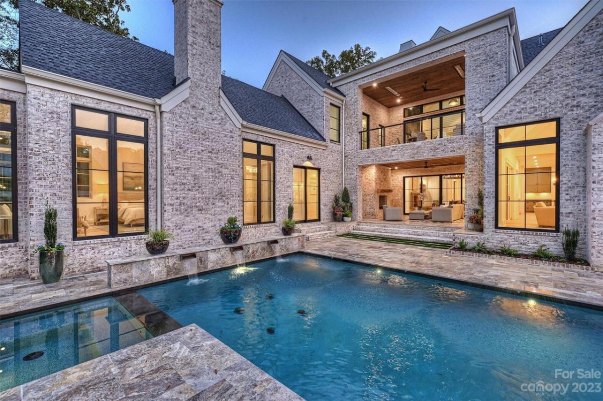 Rear view of the mansion with pool.