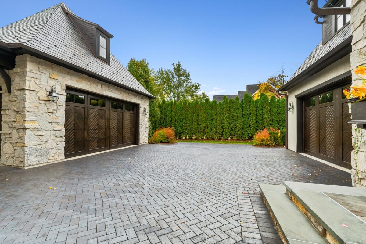Garage with spacious driveway.