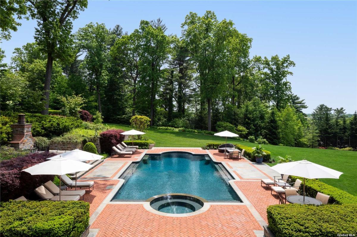 Pool with lounge chairs.