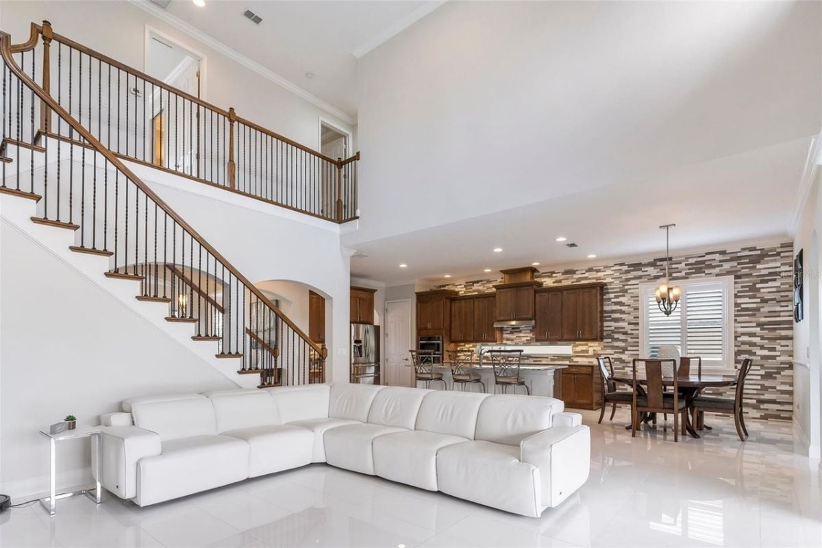 A great room featuring living space, a dining area, and an integrated kitchen.