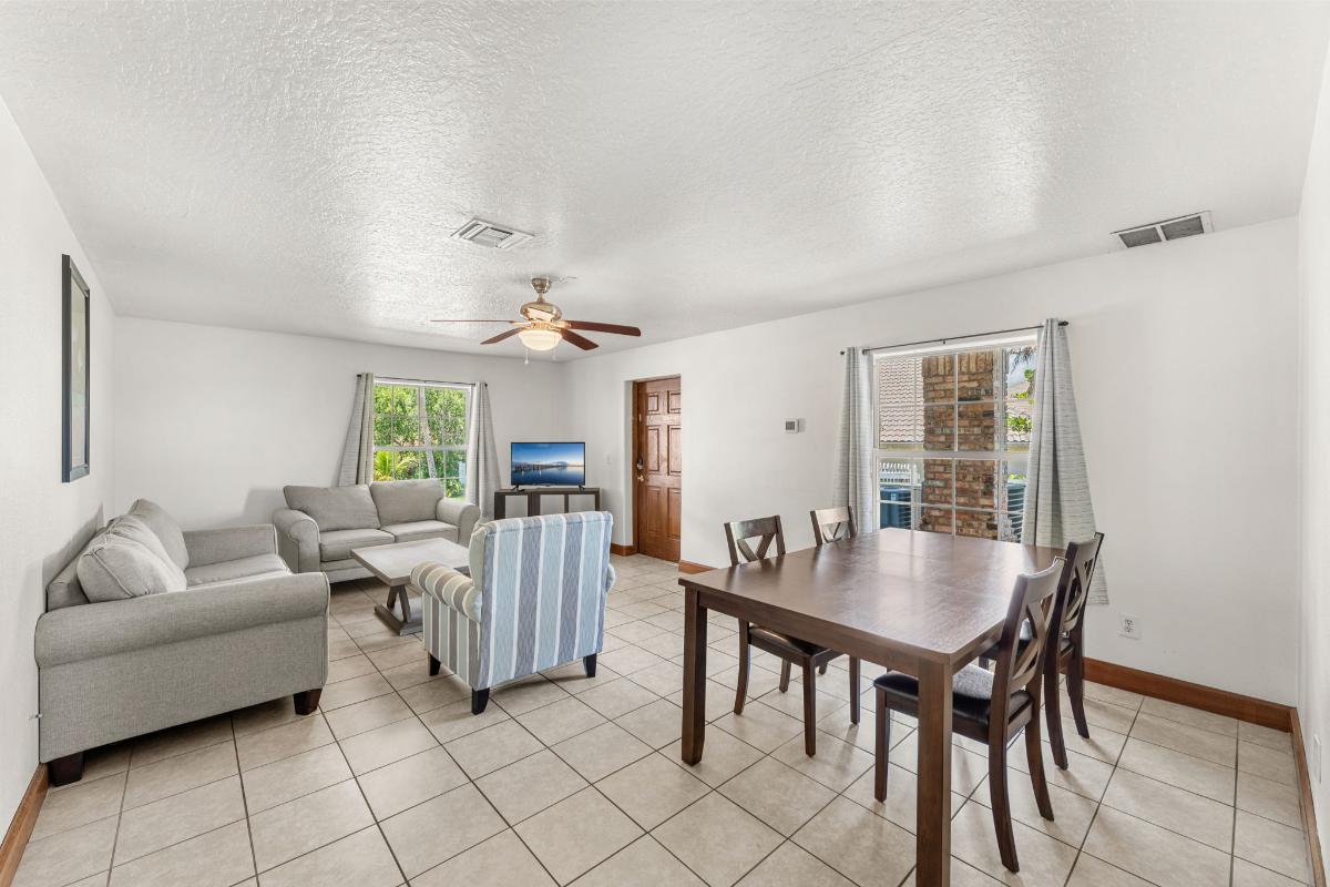 Dining room with a wood table and chairs.